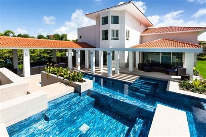 Can I buy a house in Puerto Rico living in USA?