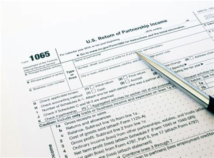 How do you fill out a 1065 form?