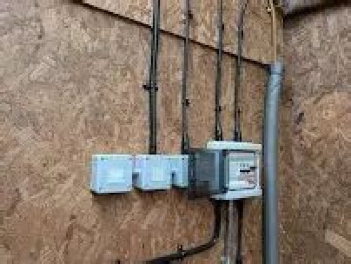 How much does an electrician charge per point?