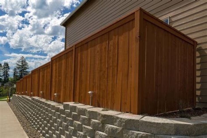Is uphill neighbor responsible for retaining wall SA?