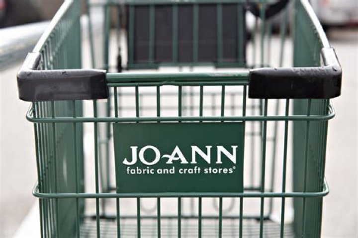What company owns Joann Fabrics?
