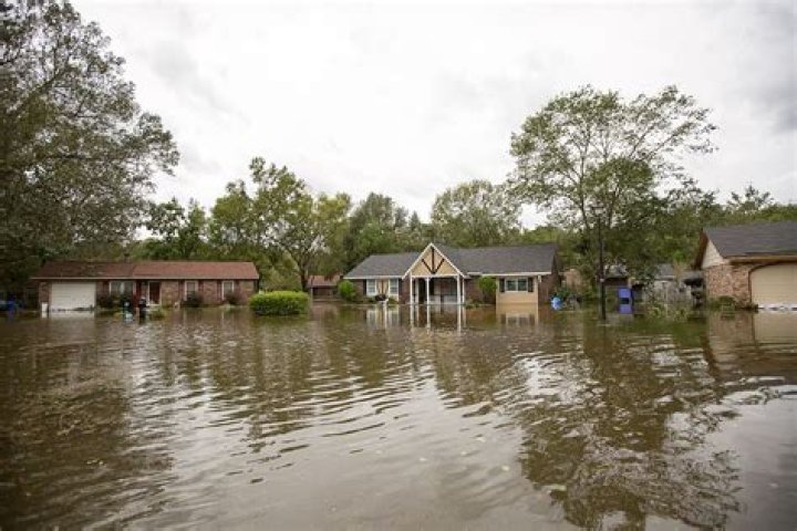 What damage can a flood cause to a house?
