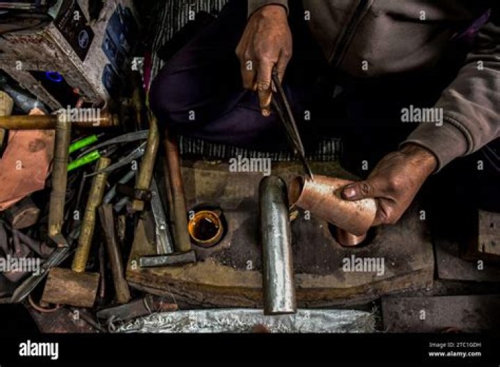 What do you call a person who repairs roof?