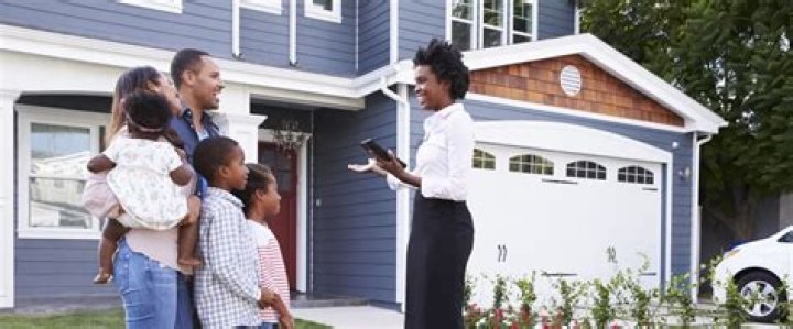 What do you call someone who buys and sells houses?