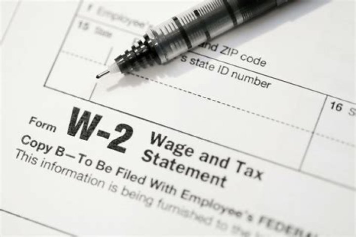 What form does an employer use to report wages to an employee?