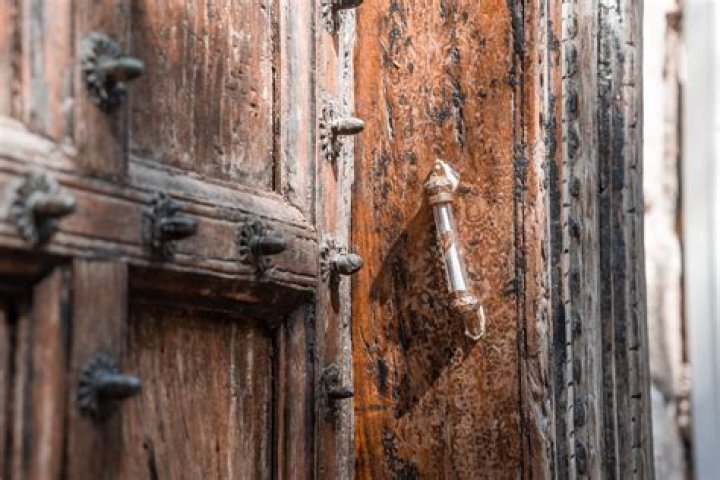 Why do Jews put the mezuzah on every door?