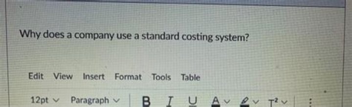 Why does a company use a standard costing system?